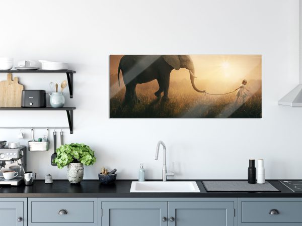 Kind und Elefant bei Sonnenuntergang, Glasbild Panorama Rabatt – Bild 3