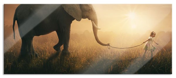 Kind und Elefant bei Sonnenuntergang, Glasbild Panorama Rabatt
